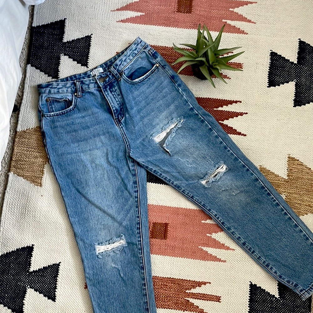 High-waisted distressed boyfriend jeans